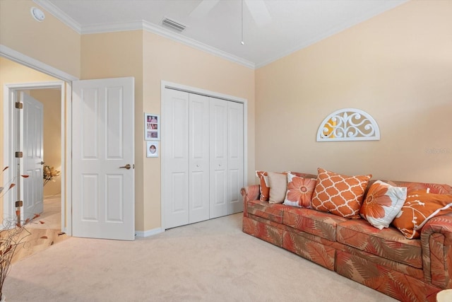 living room with ornamental molding and light colored carpet