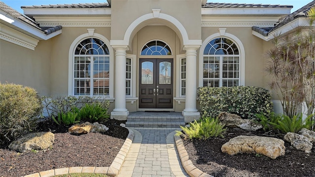 view of exterior entry with french doors