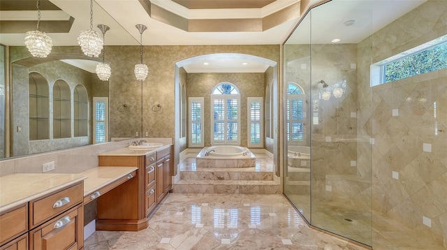 bathroom featuring crown molding, vanity, plus walk in shower, and a wealth of natural light