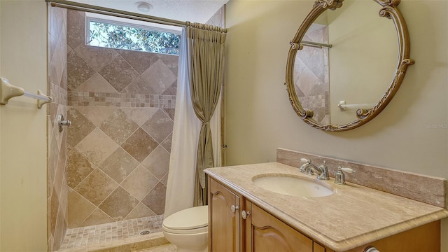 bathroom featuring vanity, a shower with curtain, and toilet