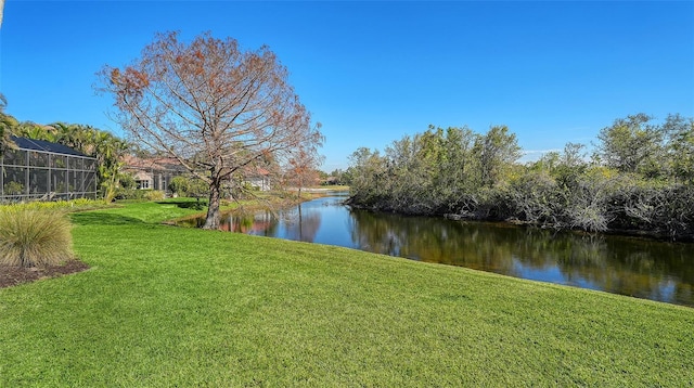 view of yard with a water view