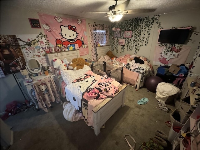 bedroom with ceiling fan and a textured ceiling