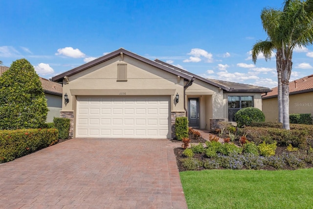 ranch-style home with a garage