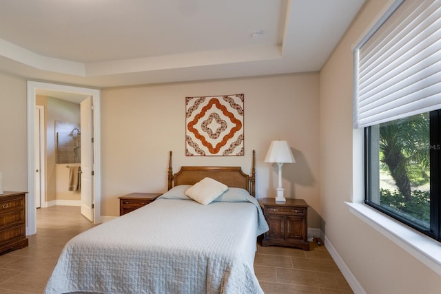 bedroom featuring a tray ceiling