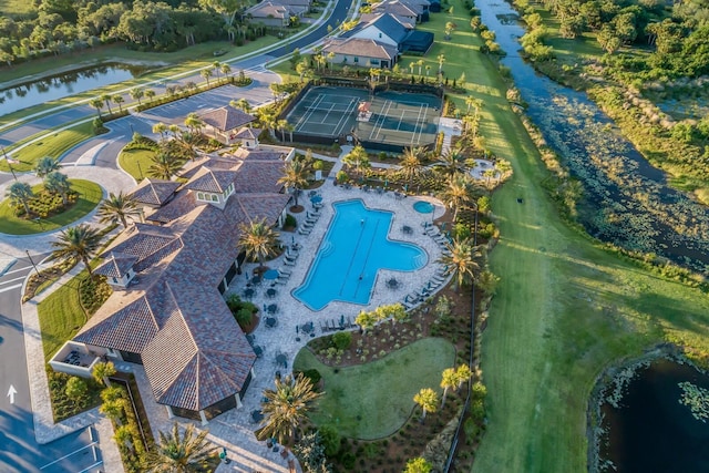 drone / aerial view with a water view