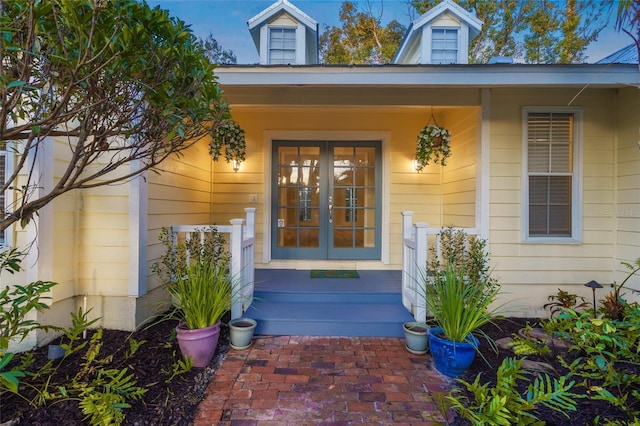 property entrance featuring french doors