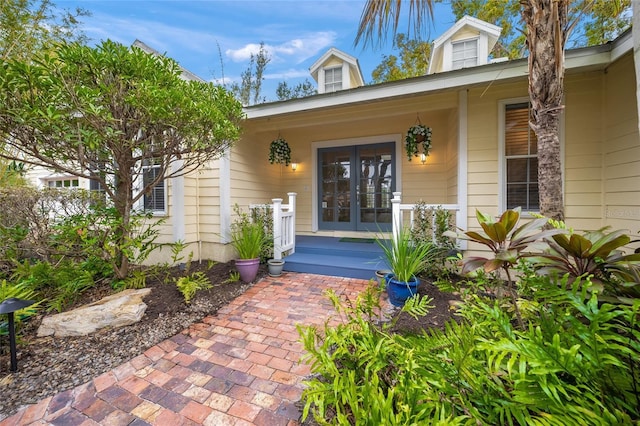 doorway to property with a porch