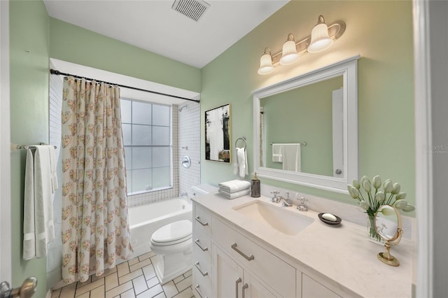 bathroom featuring toilet, vanity, shower / bath combination with curtain, and visible vents