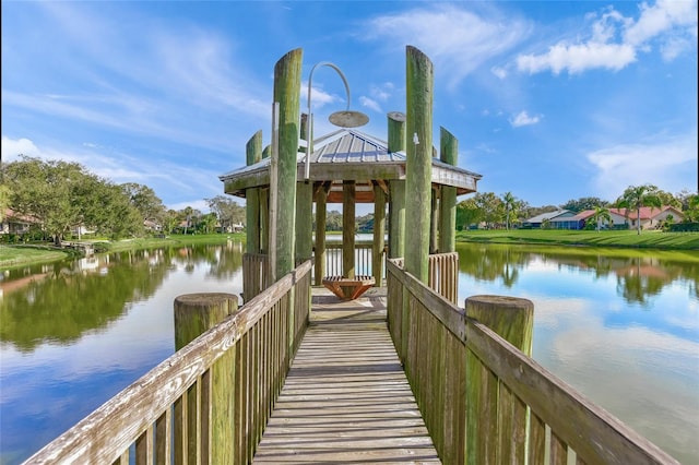 dock area with a water view