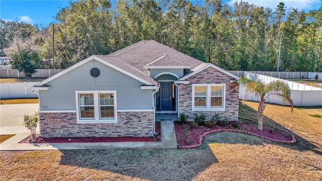 view of front of house with a front lawn