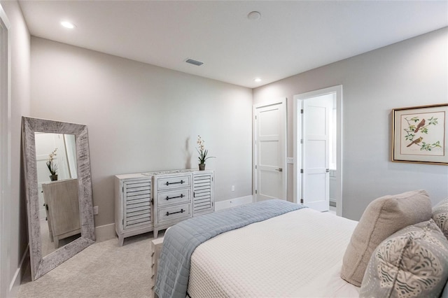 bedroom with light carpet