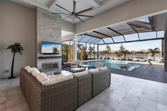 view of pool featuring a fireplace and ceiling fan