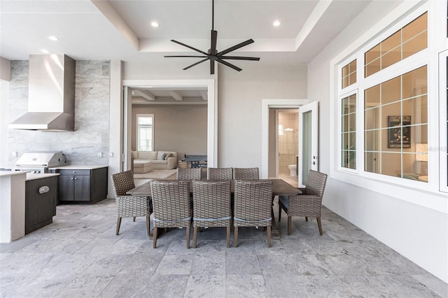 view of patio / terrace with ceiling fan and area for grilling