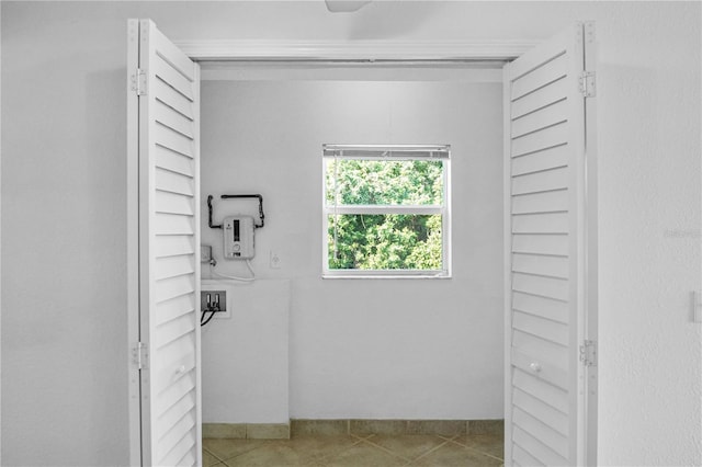 bathroom with tile patterned flooring