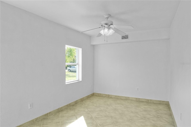 spare room featuring ceiling fan