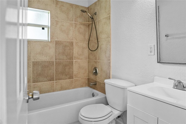 1226 Coral Ridge Dr, Punta Gorda, FL 33950 - bathroom featuring vanity, a textured wall, toilet, and bathing tub / shower combination