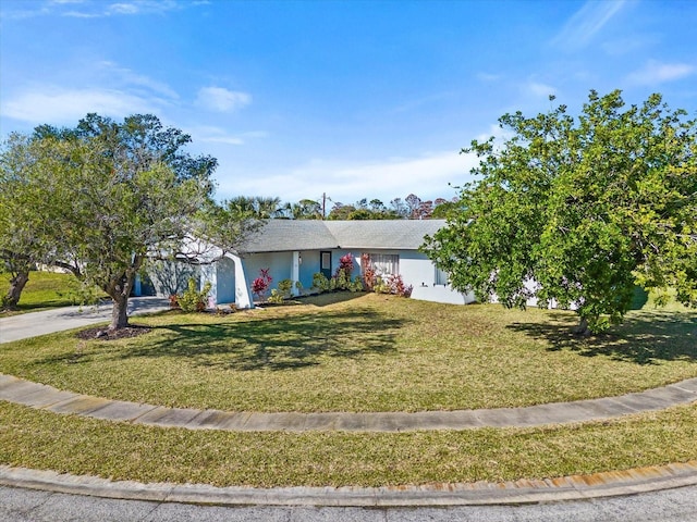 ranch-style house with a front yard