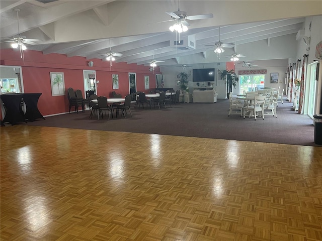 dining space featuring parquet flooring, high vaulted ceiling, and beamed ceiling