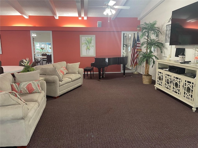 living room featuring ceiling fan, beam ceiling, and carpet