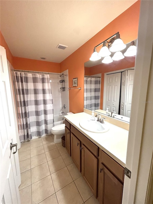 full bathroom featuring vanity, tile patterned flooring, shower / bath combination with curtain, and toilet