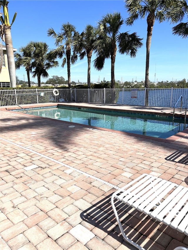 view of swimming pool with a patio area