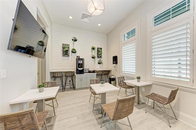 interior space with recessed lighting, visible vents, light wood finished floors, and baseboards