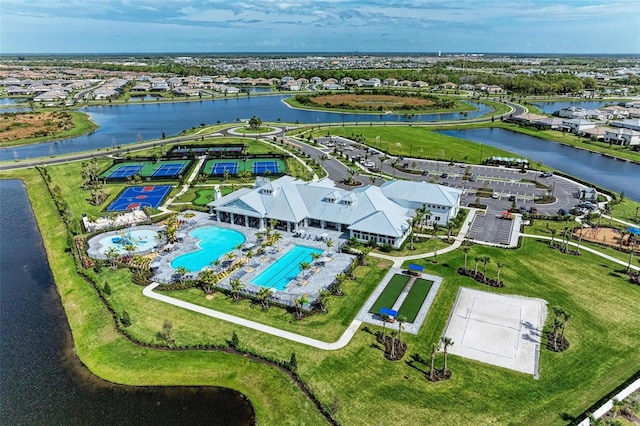 aerial view with a water view and a residential view