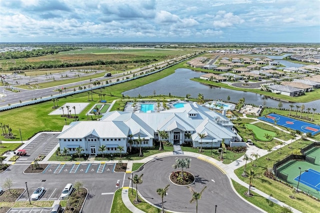 aerial view featuring a water view and a residential view