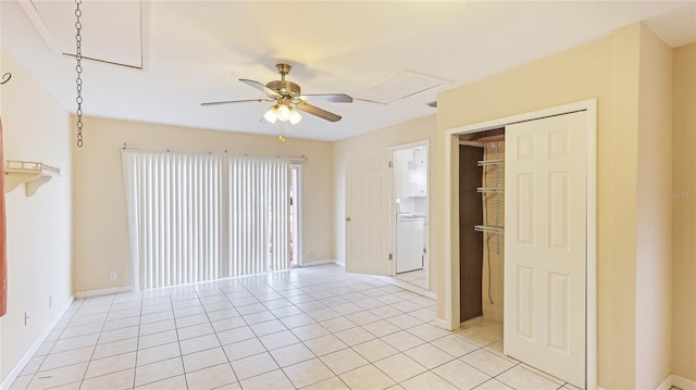 spare room with light tile patterned floors and ceiling fan