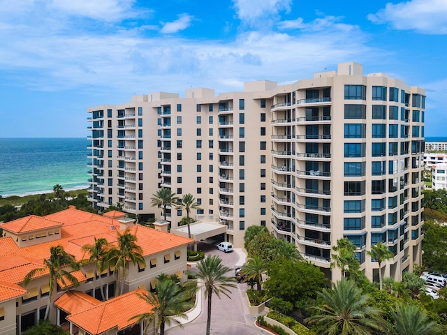 view of building exterior with a water view