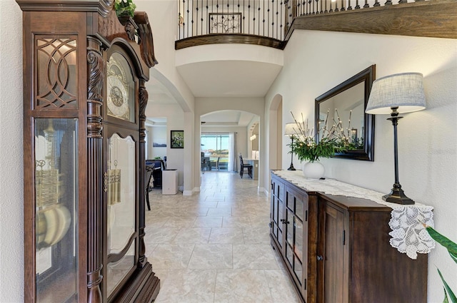 foyer featuring a high ceiling