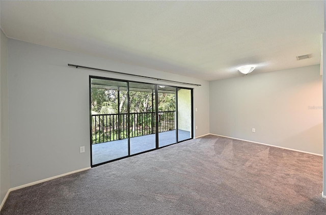 unfurnished room with carpet floors