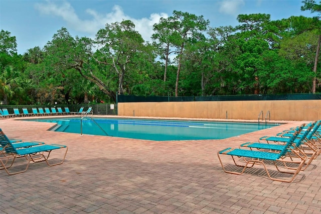 view of pool featuring a patio