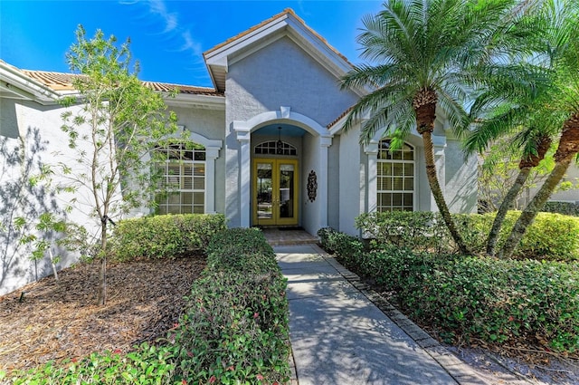 entrance to property featuring french doors