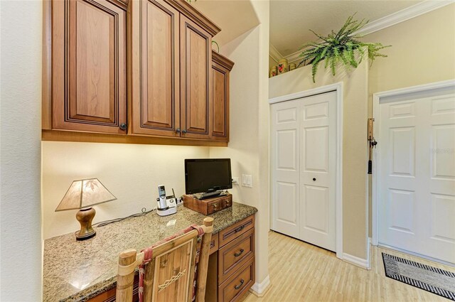 7215 Treymore Ct, Sarasota, FL 34243 - office space featuring crown molding and light hardwood / wood-style flooring