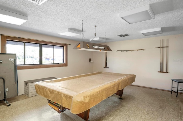 recreation room with billiards and a textured ceiling