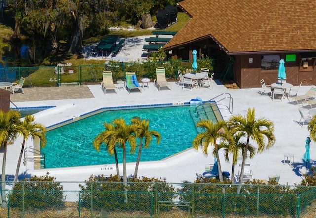 view of swimming pool featuring a patio