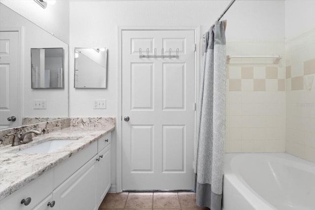 bathroom with shower / bath combination with curtain, tile patterned floors, and vanity