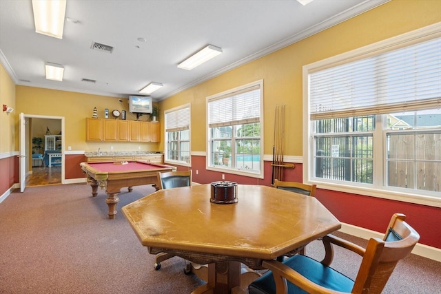 recreation room featuring crown molding, pool table, and light carpet