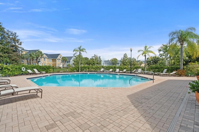 view of pool featuring a patio