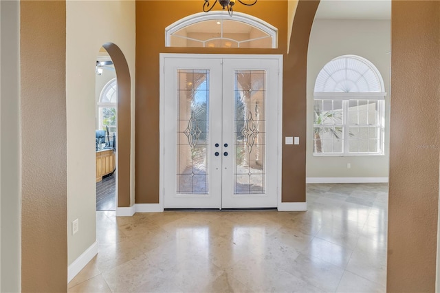 foyer featuring french doors