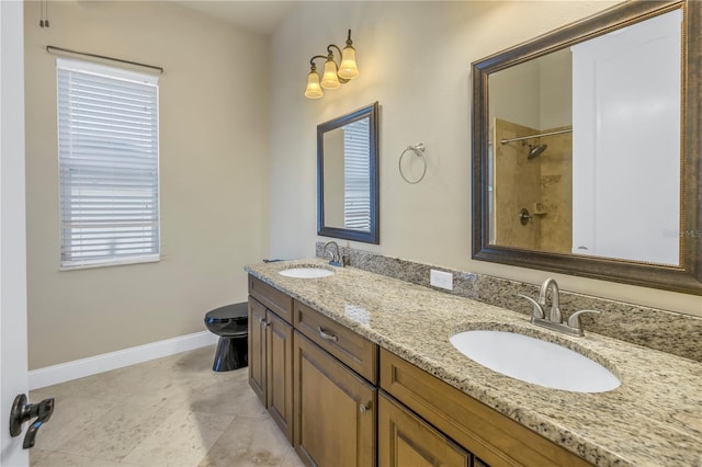 bathroom featuring vanity and a shower