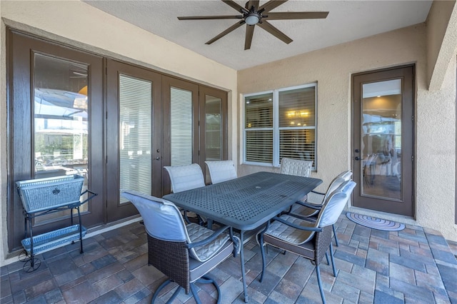 view of patio with ceiling fan