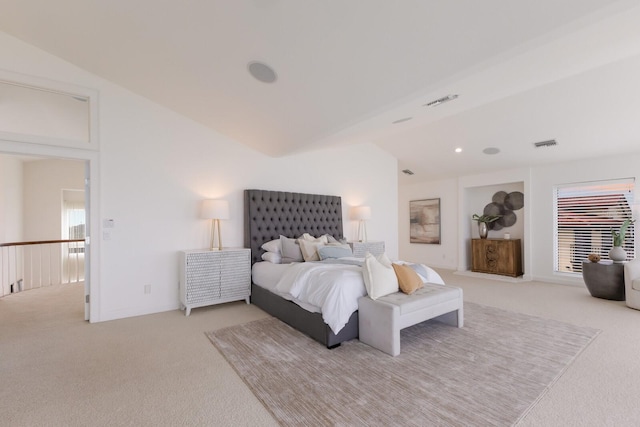 carpeted bedroom featuring vaulted ceiling