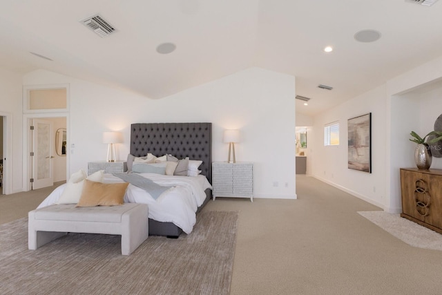 bedroom with light carpet and vaulted ceiling