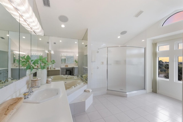 bathroom featuring tile patterned floors, plus walk in shower, vaulted ceiling, and vanity