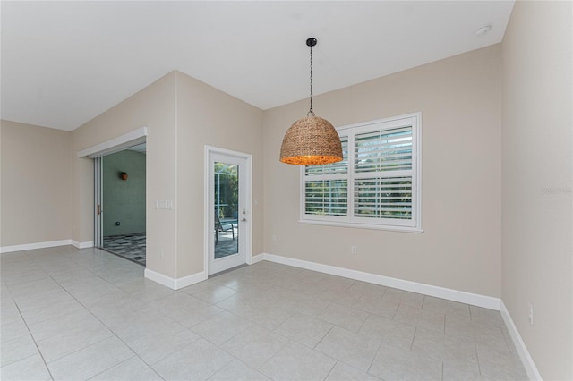 empty room with light tile patterned floors