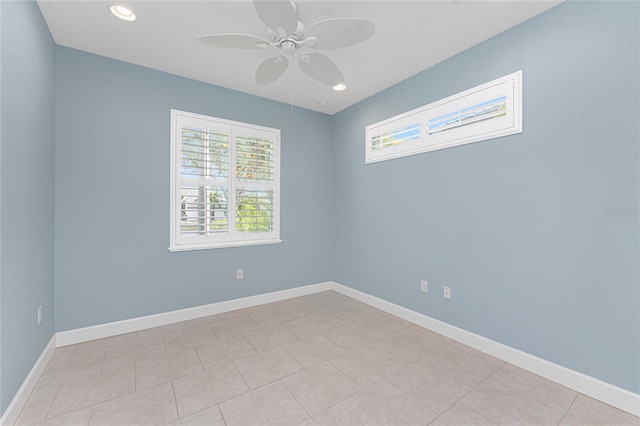 spare room featuring ceiling fan