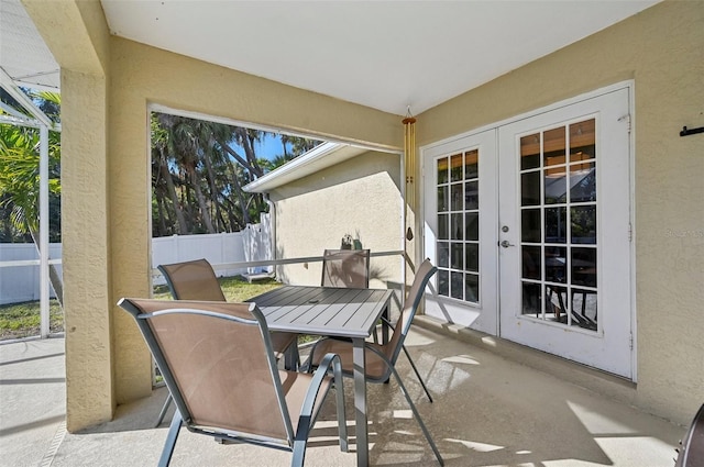 sunroom featuring french doors