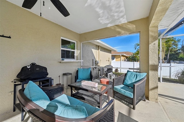 view of patio with ceiling fan and outdoor lounge area